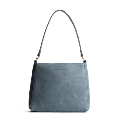 Storm*Small | Triangular shoulder bag with antiqued brass finished hardware