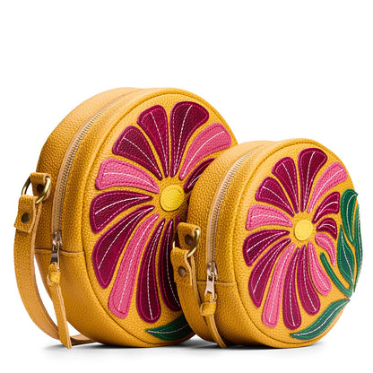 Wildflower Sunshine | Large and small circle shaped crossbody bags with large flower embroidered design